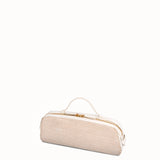 Cream-colored handbag with gold accents on a white background